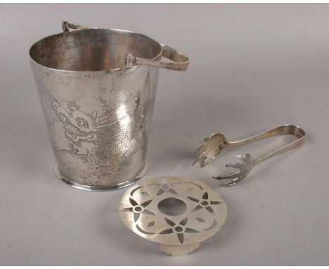 A Chinese silver swing handle ice bucket with drainer and tongs, Planished and engraved with dragon chasing flaming pearl, Ta