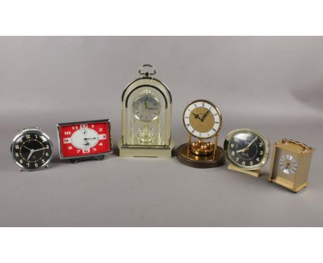 A selection of six various clocks to include, a 'President' carriage clock with Quartz mechanism, a 'Big Ben' Westclox alarm 