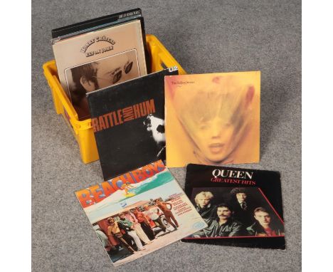 A collection of vinyl LP records, The Rolling Stones, Beach Boys, U2, Queen examples  