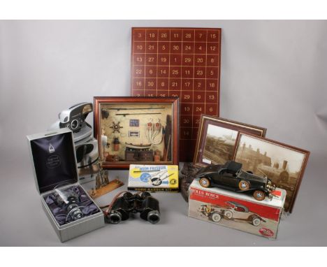 A box of miscellaneous comprising of a boxed Polaroid camera with film and instructions, a pair of Aitchinson Binoculars, a C