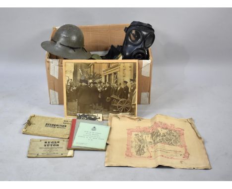 A Collection of Various Militaria to include Gas Mask, Photographs, Helmet, Manuals to include Recognition Pictorial Manual a
