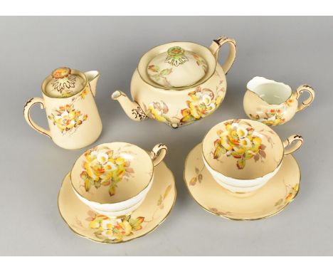 A Paragon Claire-de-dijon Tea For Two Seven Piece Service to Comprise Two Cups, Two Saucers, Teapot, Hot Water Pot and a Milk