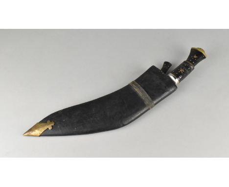 A Vintage Kukri Knife with Two Daggers in Brass Mounted Leather Scabbard