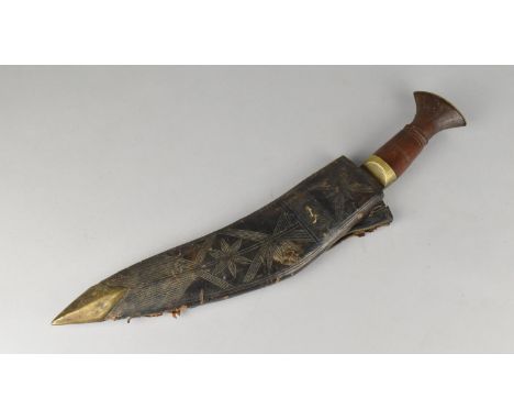 A Vintage Brass Mounted Wooden Handled Kukri Knife with Leather Scabbard