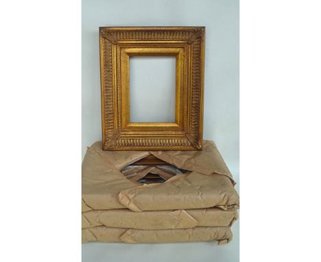 A Collection of Four(4) Gold Traditional Ornate Picture Frames. Overall Dimensions: 12.50 x 10.50". Image: 5" x 7" Issued: 20