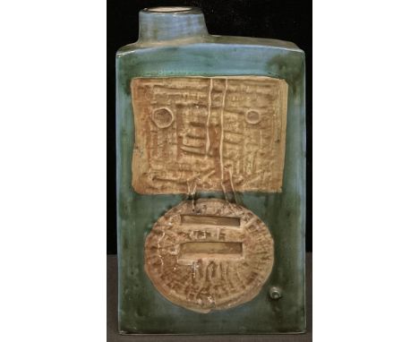 A Troika slab sided chimney vase, decorated and inscribed with a mask and geometric shapes, 19.5cm, painted trident mark, c.1