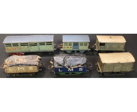 Toys &amp; Juvenalia - a collection of Hornby O gauge tinplate rolling stock including an LMS meat van with sliding doors; ot