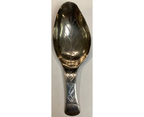 A George III silver tea caddy spoon, in the form of a leaf 