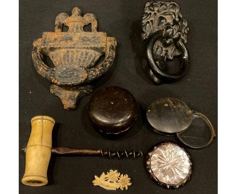 A cast iron Regency style door knocker; a lion mask door knocker; a horn folding magnifying glass; a papier mache box and cov