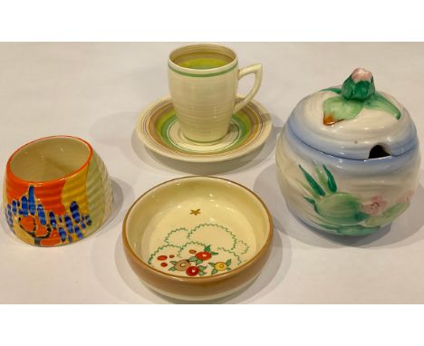 A Clarice Cliff Bizarre Fantasque Windbells pattern sugar bowl, 5cm, printed Newport Pottery mark in black, c.1930; a Clarice
