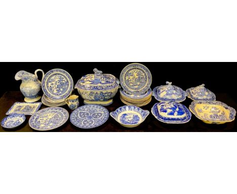 A large Victorian willow pattern soup tureen and cover, with associated ladle, 34cm wide, 28cm high; other 19th century blue 
