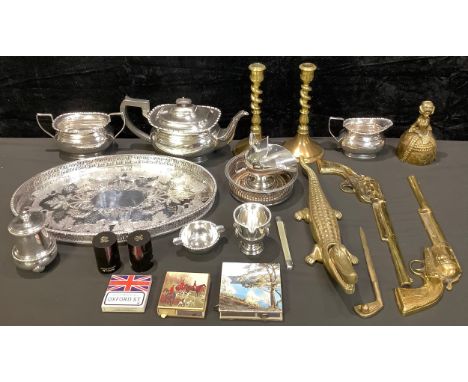 An EPNS three piece boat shaped tea service on tray; other plated items, sugar scuttle, wine bottle coaster, etc; a brass cro