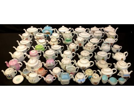 Teapots - assorted late 19th/early 20th century continental porcelain souvenir teapots, British coastal and other named views