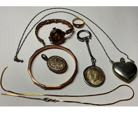 A 9ct rose gold bangle; a 9ct gold lady's wristwatch; a gold coloured metal gypsy set ring; a 9ct gold necklace (a/f); a silv