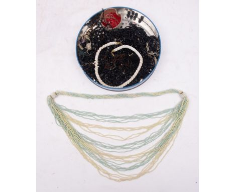 An early 20th century 'Flapper' style beadwork necklace in light green, cyan colours, together with a collection of various e