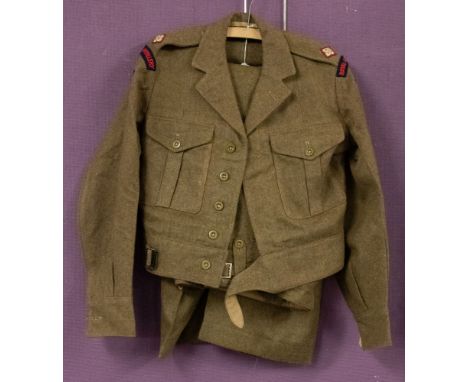 A 1949 Pattern Royal Artillery Battle dress and trousers, Post War issue single breasted blouse with RA insignia, size 7, dat