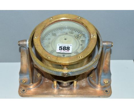 A BRASS NAVAL COMPASS, maker AFT and 41AA/49 to base, remains of grey paint to stand