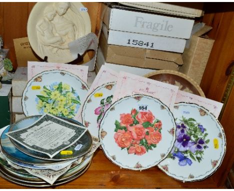 A GROUP OF COLLECTORS PLATES ETC, to include four Royal Albert 'The Queen Mothers favourite Flowers' a Bradex Madonna plaque,