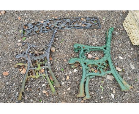 A PAIR OF CAST IRON BENCH ENDS, and back and another pair of bench ends (5)