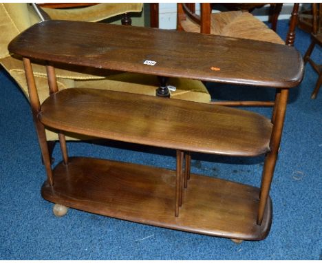 AN ERCOL THREE TIER TROLLEY, on tapering cylindrical supports, approximate size width 91.5cm x depth 31.5cm x height 70.5cm