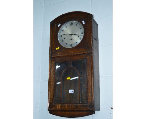 A MID 20TH CENTURY OAK WALL CLOCK, and a mantle clock (2)