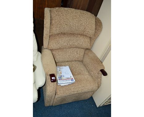 A HSL ELECTRIC RISE AND RECLINE ARMCHAIR WITH OATMEAL UPHOLSTERY (purchase receipt from July 2017 included and manual)