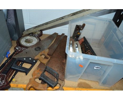 A PLASTIC BOX, containing saws, Stanley and other wood planes and a modern barometer