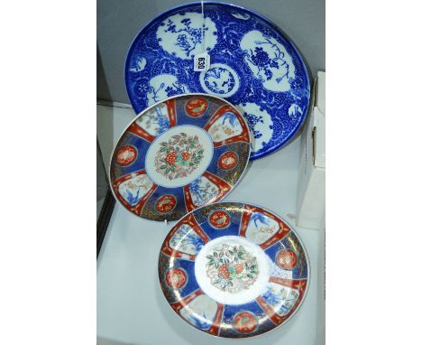 AN ORIENTAL BLUE AND WHITE CHARGER, (no writing underneath) diameter approximately 29cm (hairline), together with a pair of p