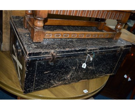 A VINTAGE TIN TRUNK, with key, approximate size width 83cm x depth 49cm x height 31cm
