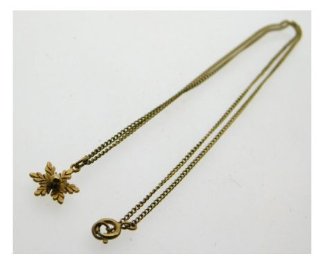 A 9ct gold chain with snowflake pendant, 1.9g, 16in long 