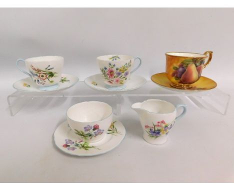 Three Shelley Wild Flowers 13668 cups &amp; saucers with matching creamer twinned with a fruit decorated cup &amp; saucer