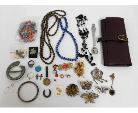 A quantity of costume jewellery including silver ring, filigree work white metal butterflies, a purse &amp; other items 