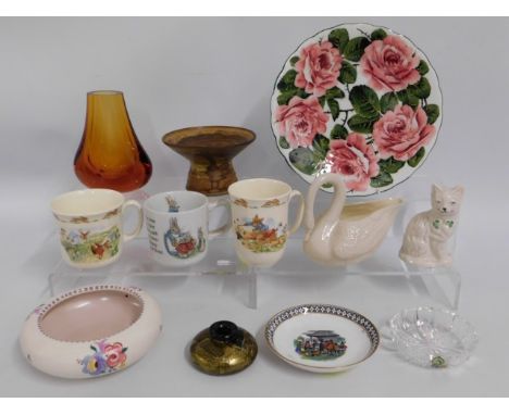 A Wemyss rose plate, three nursery ware cups, a Poole pottery bowl, a Tweedsmuir glass squat vase, a Waterford dish, Belleek 