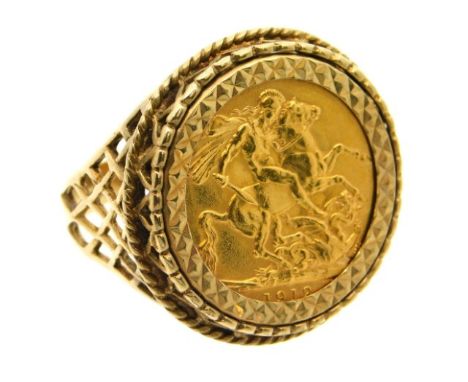 A 9ct gold mounted full gold sovereign ring, 15.2g size W