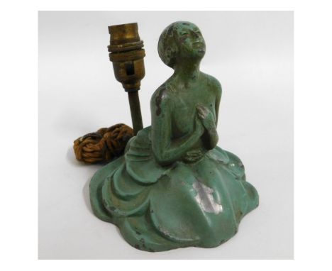 An art deco figurative spelter lamp base, lacking glass screen, 6in high x 5.5in wide