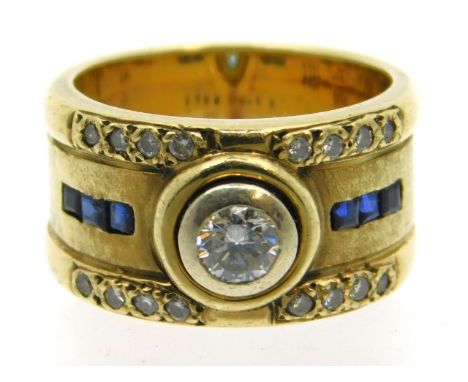 A 9ct gold ring set with collet set diamond &amp; sapphire, 9.4g, size L/M