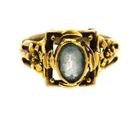 An antique "made up" ring set with aquamarine stone, top part of ring tests electronically as 15ct gold, shank as 9ct gold, 3