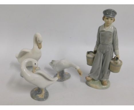 Four pieces of Lladro &amp; Nao porcelain, boy 8.5in tall