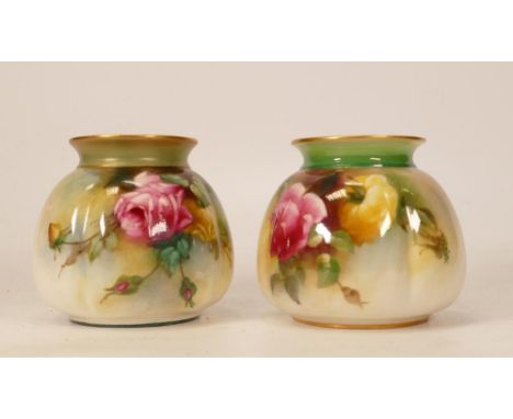Two Royal Worcester vases decorated with roses. Green backstamp to base. Height 8cm 