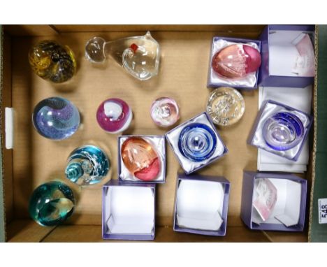 A collection of glass paperweight to include Caithness four seasons, creatures great and small, stream, harmony, 4 boxed Gian