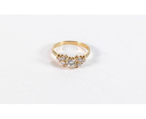 18ct gold diamond ring, centre stone approx .50ct surrounded by six smaller diamonds, ring size U,3.5g. 