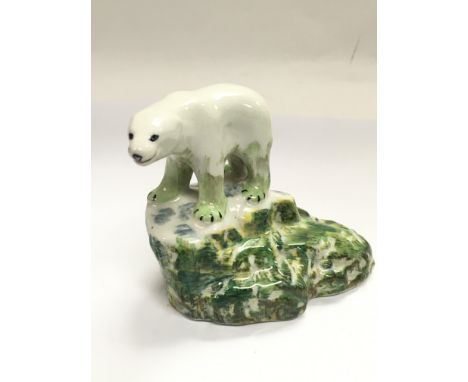 A circa 1930s ceramic figure of a polar bear, approx height 11cm.