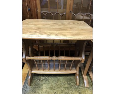 A Ercol magazine rack .