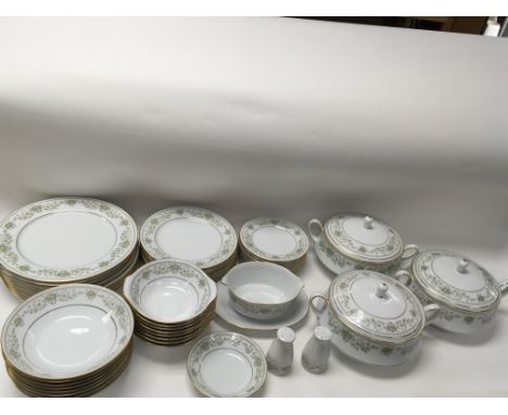 A Noritake green hill dinner service. Containing 8 plates of 3 different sizes. 8 bowls of 2 different sizes. 3 casserole dis