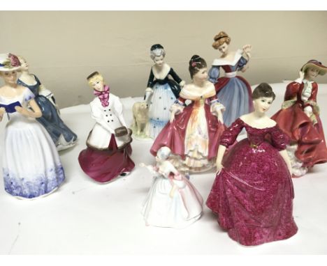 A collection of Royal Doulton figures including Amy 1991 figure of the year and other Worcester and other figures no obvious 