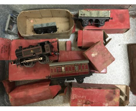 A Hornby engine carriages and wagons.