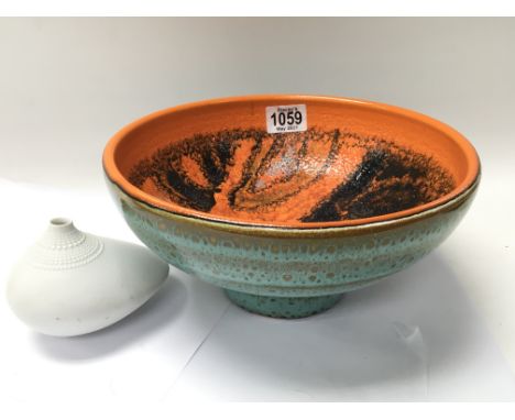 A modern design 1960 Poole pottery bowl with an orange Peel glaze and a Rosenthal studio line modern design white glazed art 