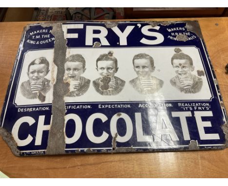 Rare large original enamel sign for “Fry’s Chocolate” showing the five boys faves. Old flattened crease between faces otherwi