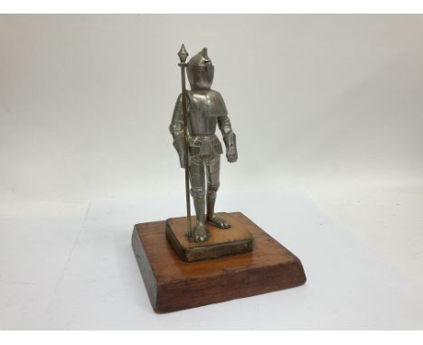 Vintage knight cigarette lighter on wooden base