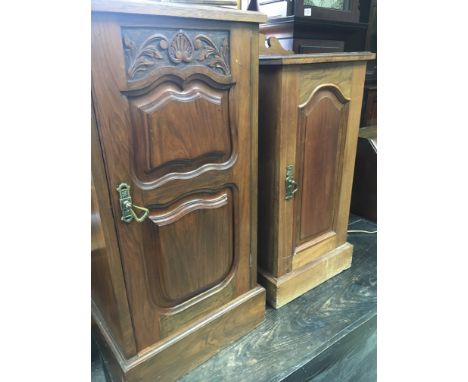 A walnut bedside cabinet fitted with a single door and one other cabinet fitted with a speaker.